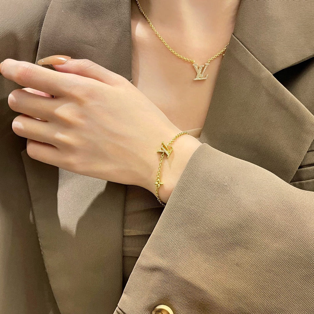 TimiLOGO STAR MOTIF GOLD BRACELET